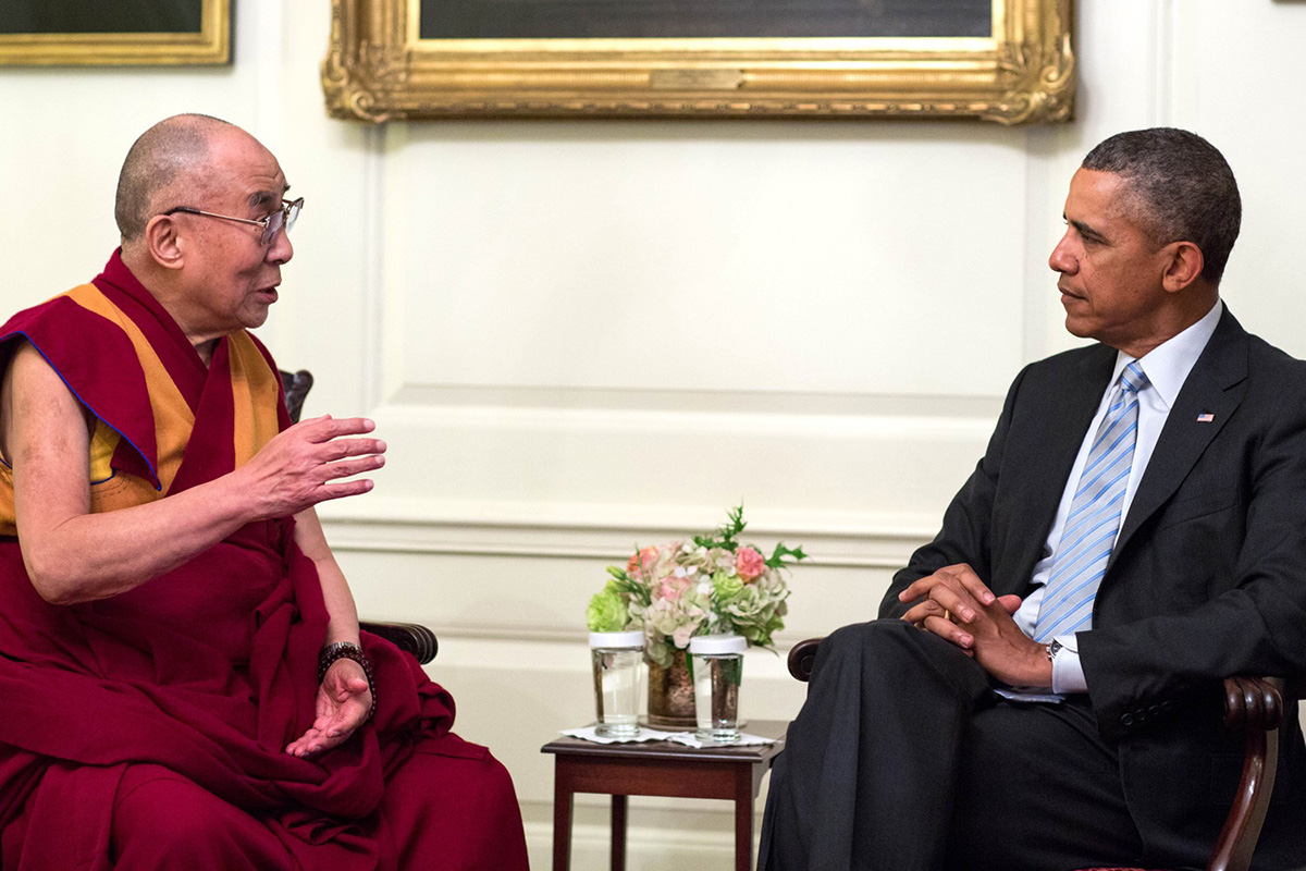 US President Barack Obama meets with the Dalai Lama in the Map Room of the White House, Washington DC, on 21 February 2014.