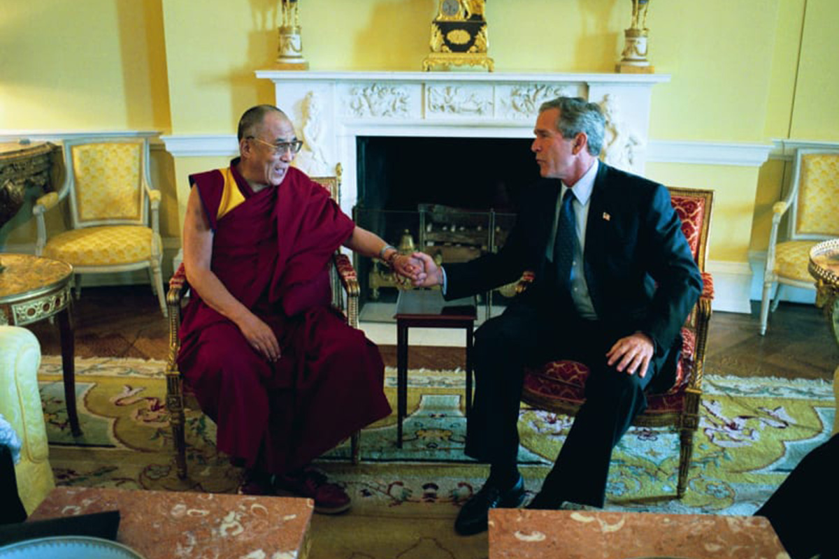 US President George W Bush meets with the Dalai Lama at the White House in Washington DC on 10 September 2003.