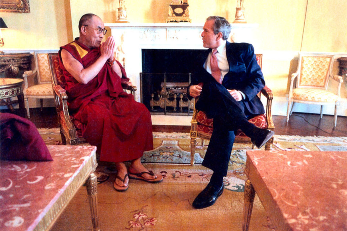 US President George W Bush meets with the Dalai Lama at the White House in Washington DC on 23 May 2001.