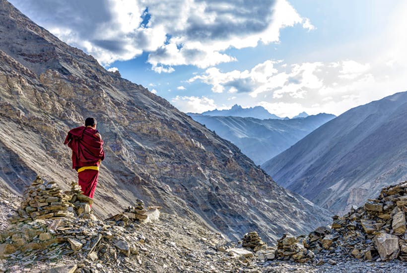 A view of Tibet's mountains, with a Tibetan Buddhist monk.