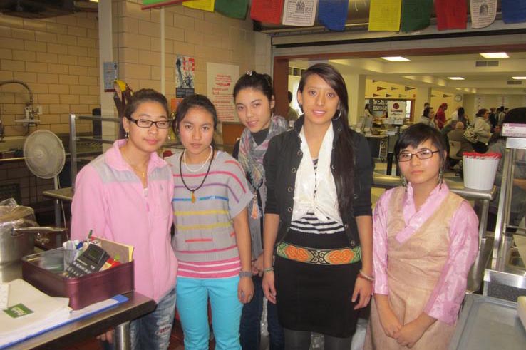 Dema Yangzom, Jiangyang Wangmu, Lobsang Dolma, Choezin Lhamo, and Tsering Dolma, in kitchen of Montville High School.