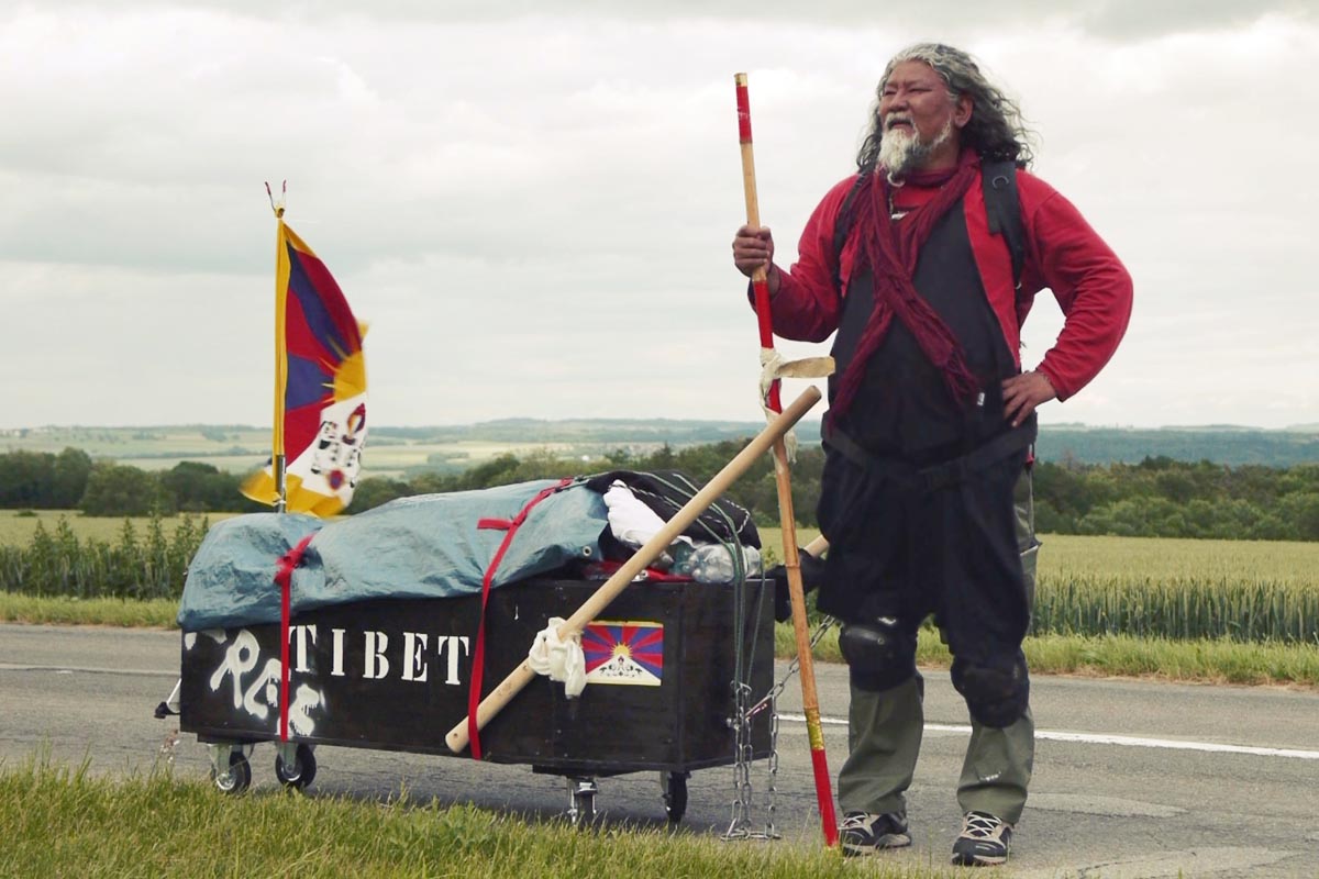 Protagonist of the documentary film Tibetan Warrior, Loten Namling, during his Coffin Campaign in Switzerland in 2012.