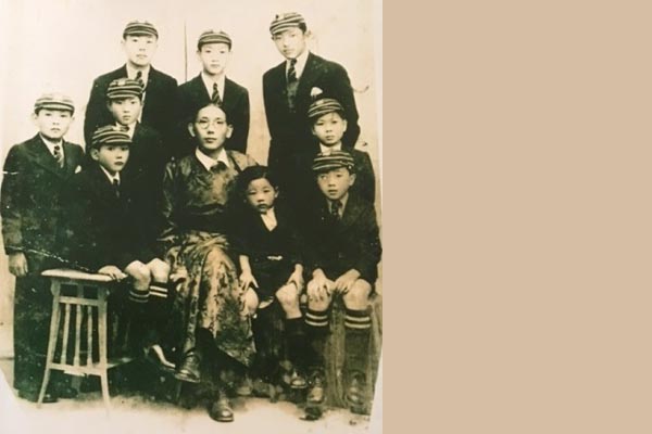 1941: Kalon Yuthok Tashi Dhondup (center) with his three sons and sons of other aristocratic families; Surkhang, 1941 Students of St Joseph's North Point, Darjeeling, India. Front Row (left to right): Yuthok Jigmie Dorji, Kalon Yuthok Tashi Dhondup, Yuthok Sichu Tsetan, Surkhang Jigme. Second Row (left to right): Yuthok Rigdhen Tsetan, Sandutsang Rinchen, Ma Tsering. Back Row (left to right): Kapshopa Dondrup, Shalo Tashi Norbu, and Taring George Namgyal..