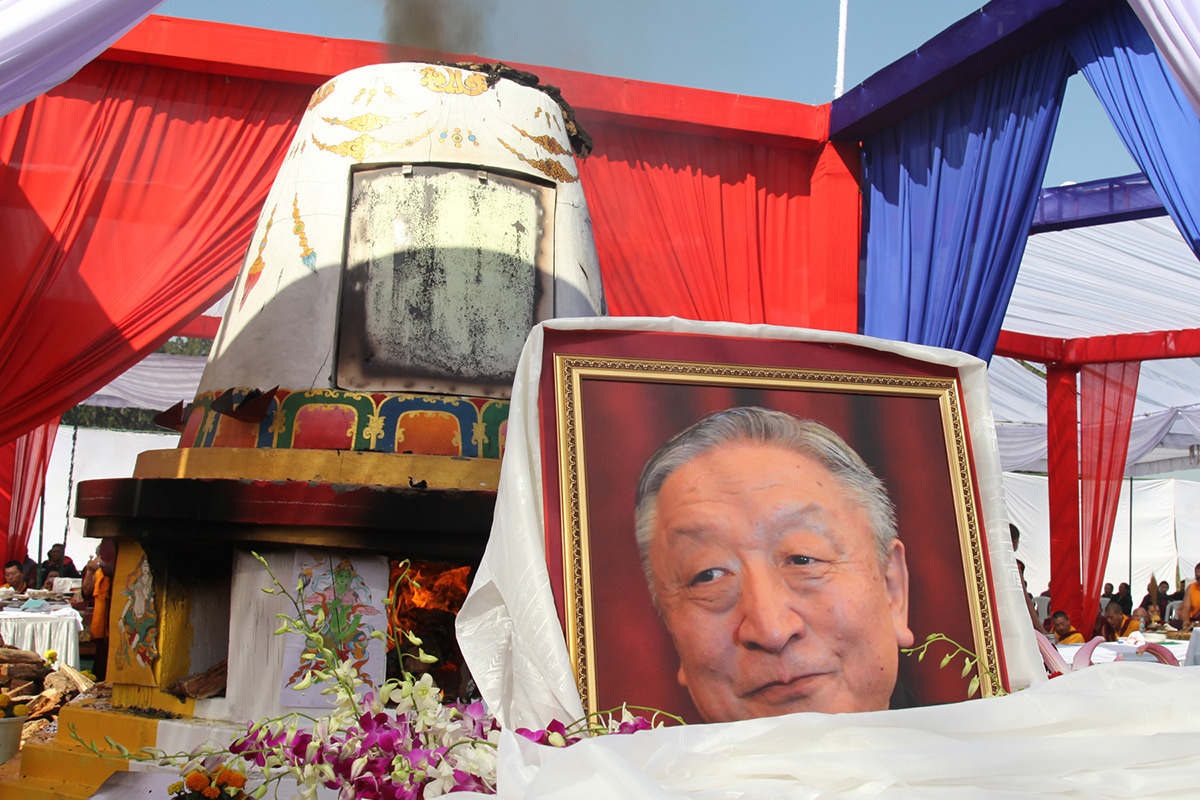 A portrait of Lodi Gyari draped with Khatas (scarves) at his funeral ceremony in Clement Town in Dehra Dun, India, on 18 November 2018.