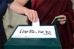 An exile Tibetan casting his vote to elect the Sikyong and members of Parliament in McLeod Ganj, India, on 20 March 2016.