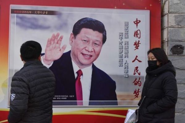 A poster of Chinese President Xi Jinping in Beijing on 26 February 2018.