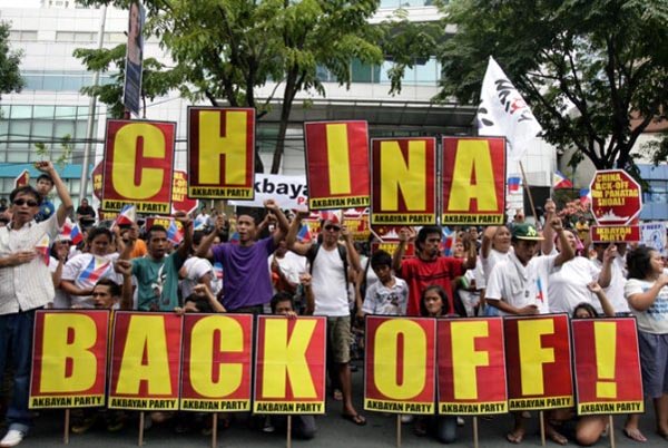 Filipino activists gather in front of the Chinese Consular Office in Makati on 11 May 2012, to protest China's 