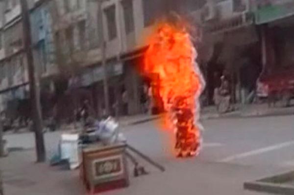Video grab image of nun Palden Choetso on fire on 3 November 2011 in Tibet.