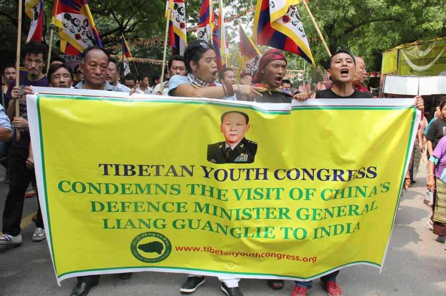 Tibetan Youth Congress activists protest against the visit by China's Defence Minister, General Liang Guanglie, and Commander of the Tibet military district, Yang Jinshan, to India, on 3 September 2012.