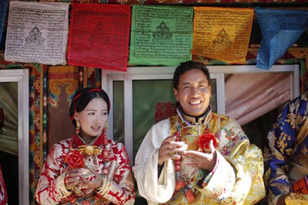 Erja (L) and Baima (R) celebrate with guests during their traditional Tibetan wedding near Rongdak (Ch: Danba), in Kham.