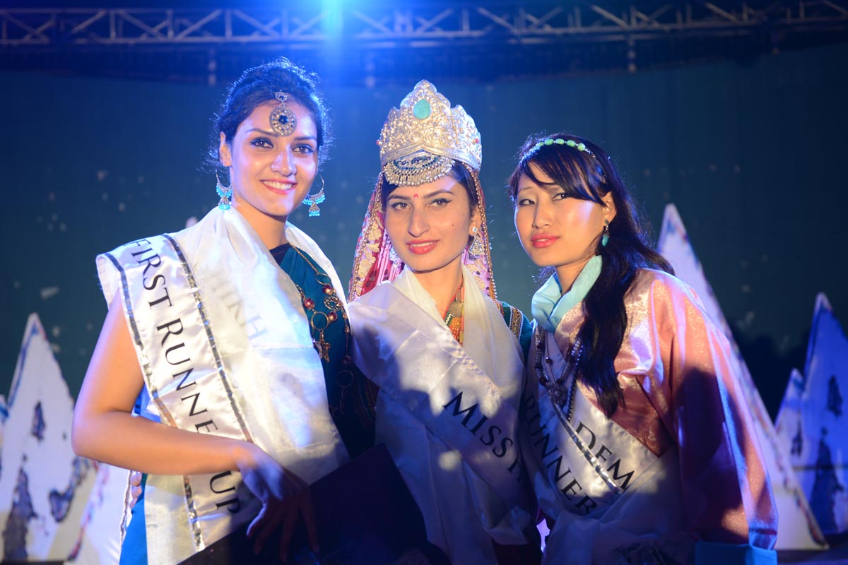 Jyoti Dogra of Bhagsu Nag, the winner of the Miss Himalaya Pageant 2014, poses for a photo after winning the Miss Himalaya Pageant crown, along with (left) Shikha Sharma from Dharamshala, the First Runner-up, and (right) Dawa Dema from Thimpu, Second Runner-up.