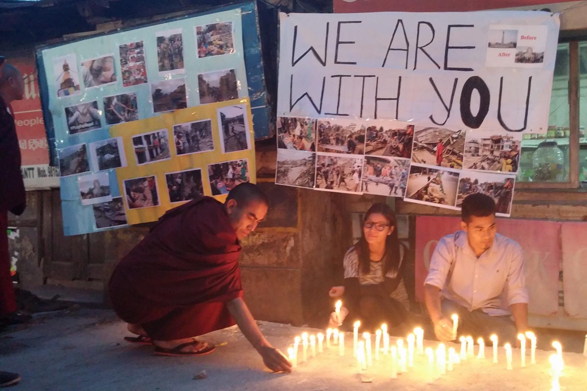 Exile Tibetans light candles during a solidarity gathering for the victims of the Nepal earthquake, in McLeod Ganj, India.