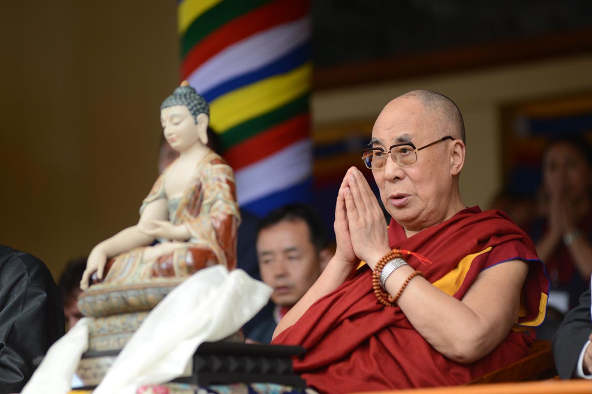 Tibetan spiritual leader the Dalai Lama prays as he celebrate his 80th birthday at Tsuglakhang temple in McLeod Ganj, India, on 21 June 2015.