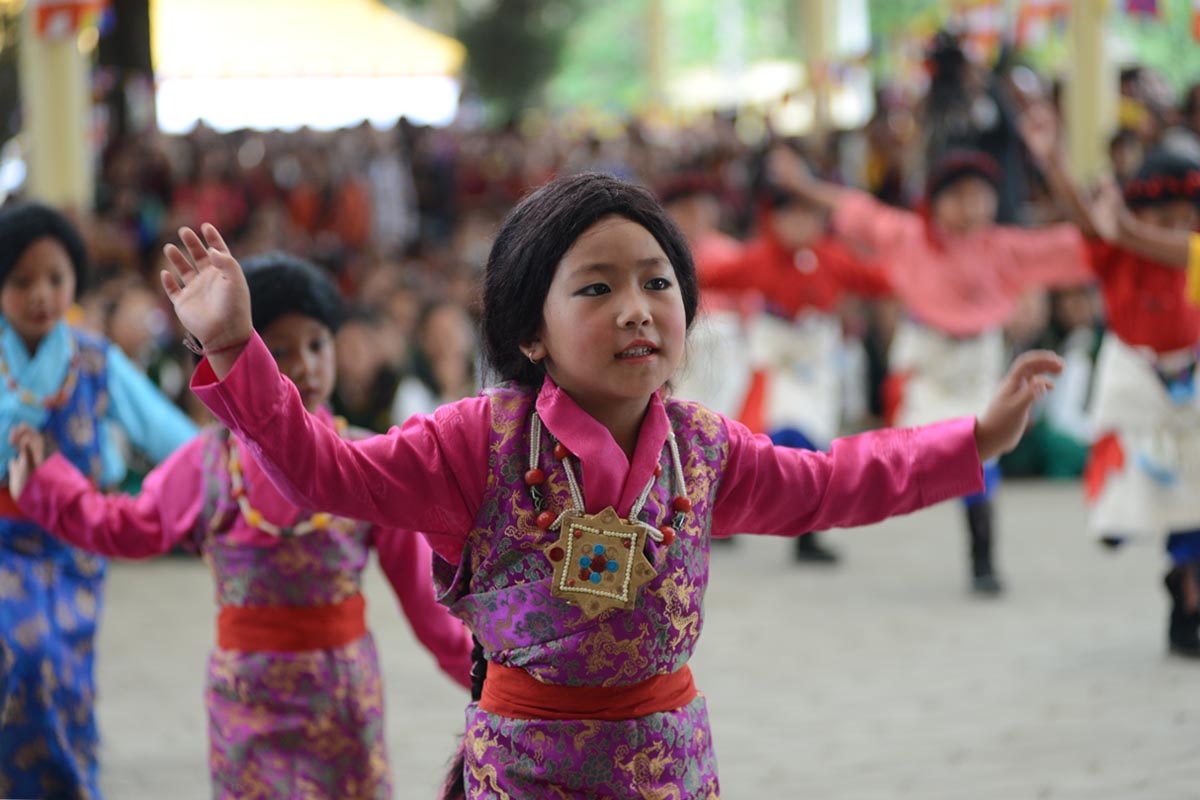 Exile Tibetan Children performs to celebrate the Dalai Lama's 80 birthday at Tsuglakhang temple in McLeod Ganj, India, on 6 July 2015.