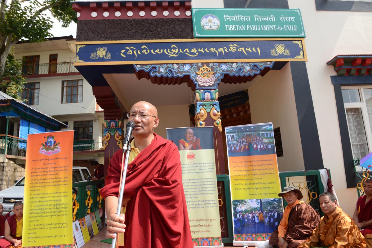 Ngawang Dorje, advisor of the Jonang Association, speaks outside the Tibetan Parliament-in-exile, as the 15th Parliament began its 10th session on 15 September 2015.