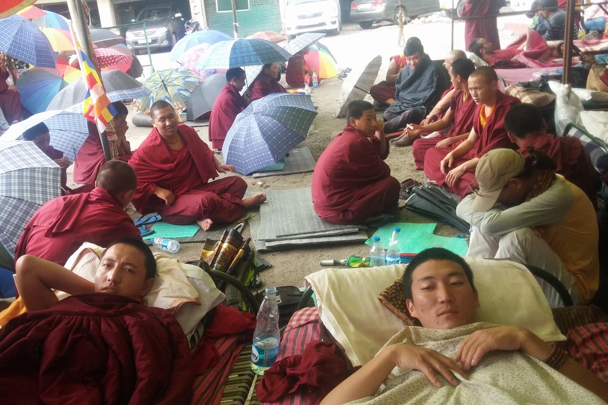 Two of the nine hunger strikers lay in bed on the seventh day of their strike outside the Tibetan Parliament-in-exile in Dharamshala, India, on 24 September 2015.