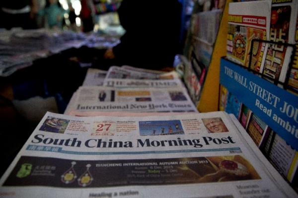 South China Morning Post at news stand.