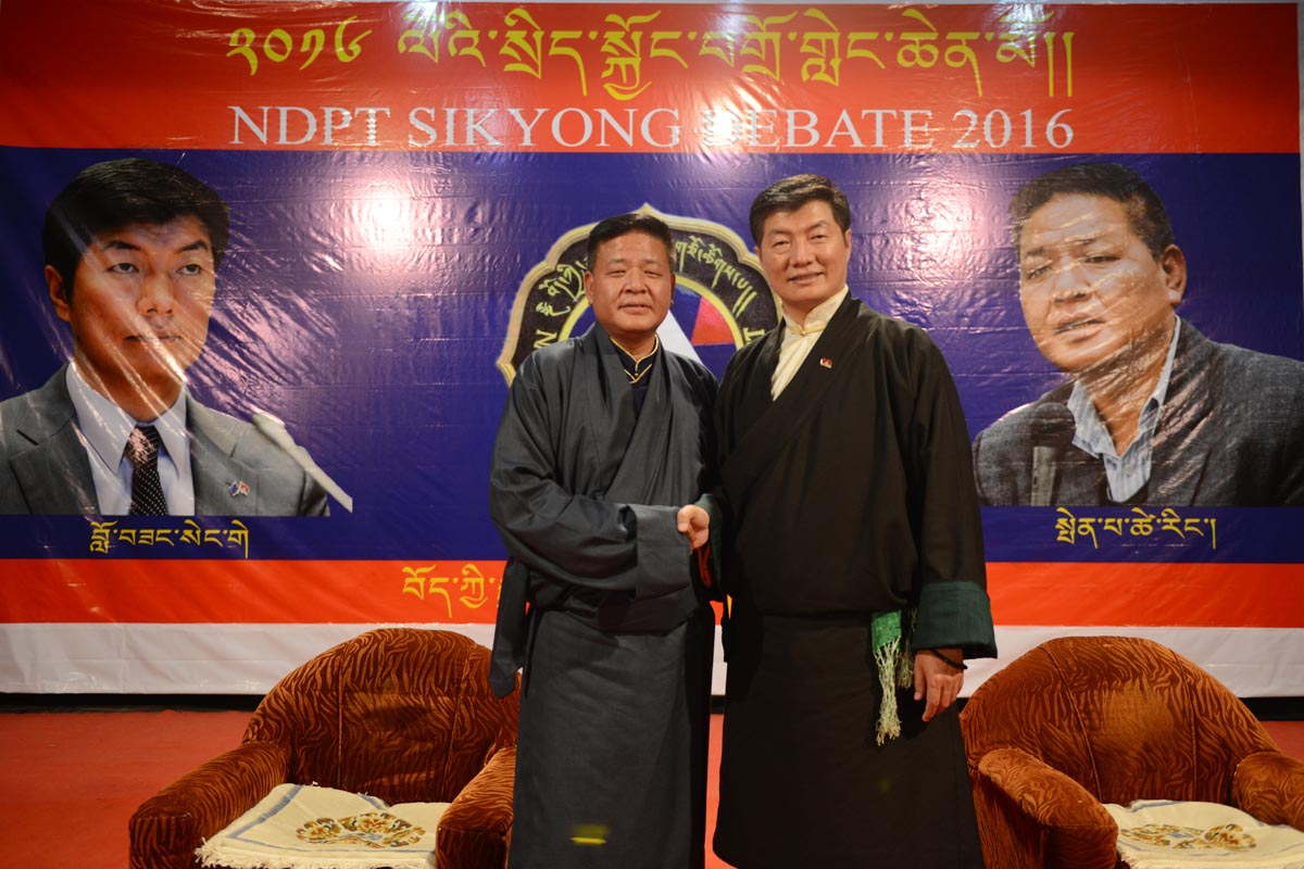 The two Sikyong 2016 candidates, Lobsang Sangay (right) and Penpa Tsering, pose for a photo after a debate organised by National Democratic Party of Tibet in McLeod Ganj, India, on 8 March 2016.