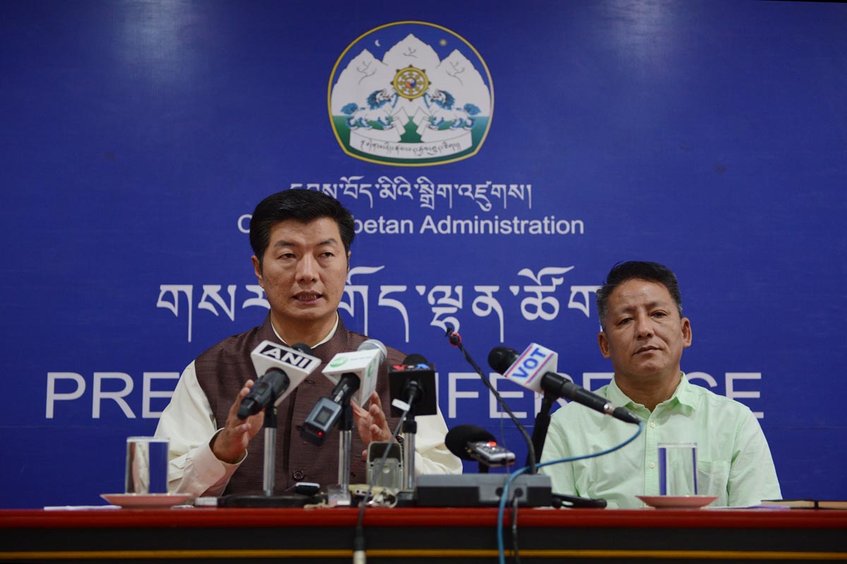 Sikyong Lobsang Sangay speaks during a press conference, as Finance Minister of the Central Tibetan Administration Karma Yeshi looks on, in Dharamshala, India, on 3 October 2016.