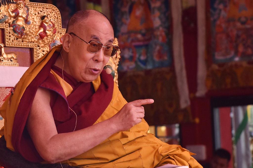 Exiled Tibetan spiritual leader the Dalai Lama delivers teachings to Buddhist followers at the Yiga Choezin ground in Tawang near the India-China border.