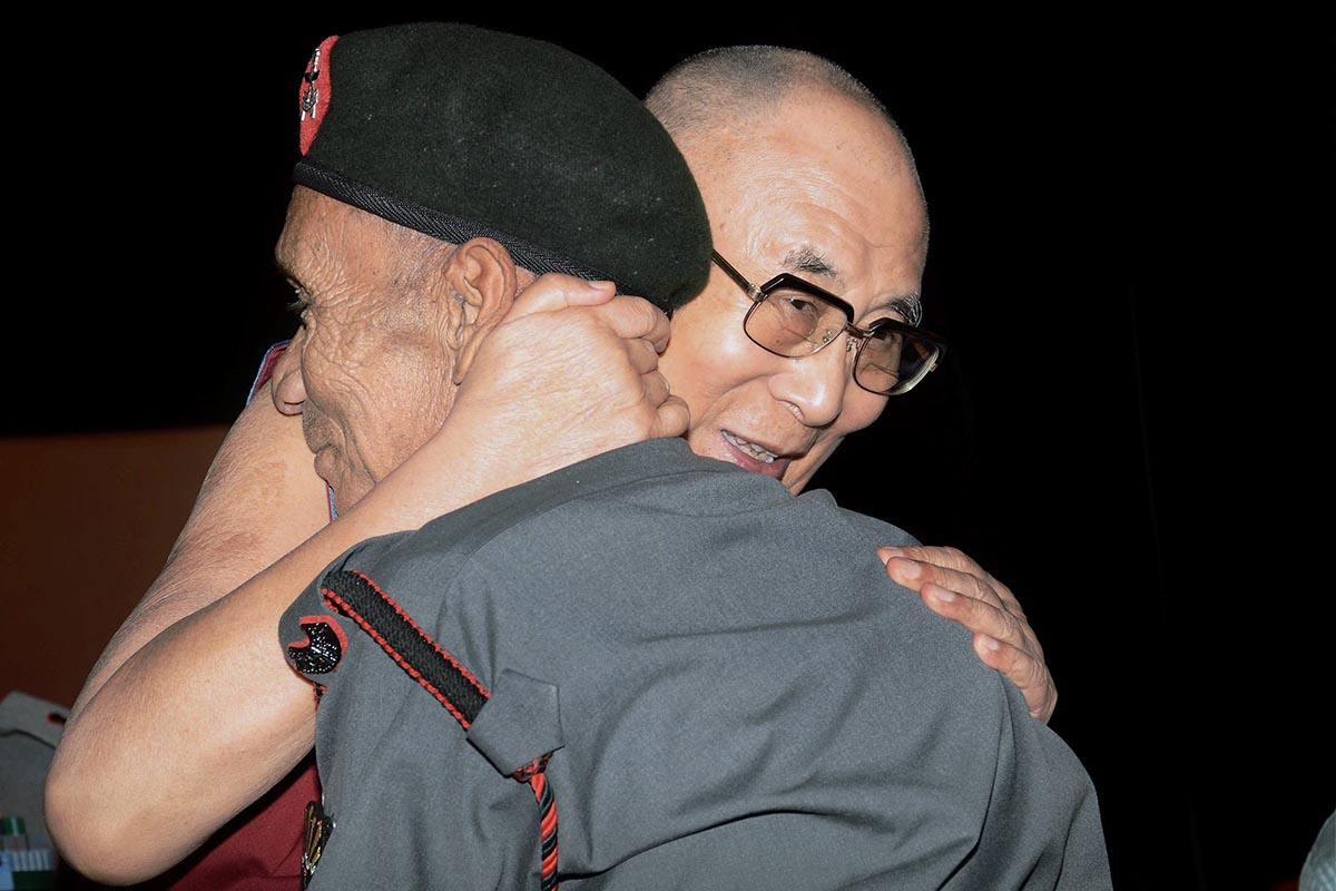 Tibetan spiritual leader Dalai Lama with Naren Chandra Das, retired havildar of 5 Assam Rifles, during Namami Brahmaputra festival in Guwahati on 2 April 2017. Das is the lone survivor of the seven Indian security personnel who received the Dalai Lama on Indian soil when he escaped from Tibet in 1959.