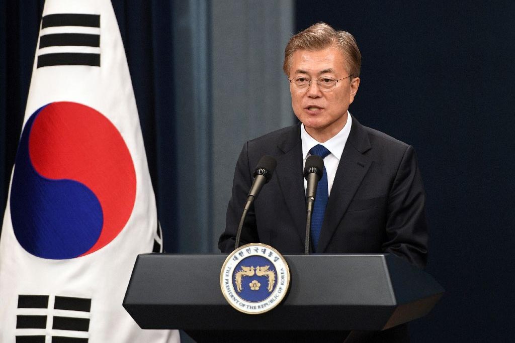 South Korea's newly elected president, Moon Jae-In, said he would fly to Washington immediately 