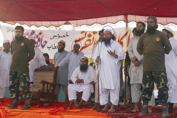 Hafiz Muhammad Saeed, the leader and chief of banned terror outfit Lashkar-e-Taiba (LeT) and the Islamic charity organization Jama'at-ud-Da'wah based in Pakistan, sharing the dais with Abdul Qudus Burmi (HuJI, Arakan) and other Rohingya leaders in 2016.