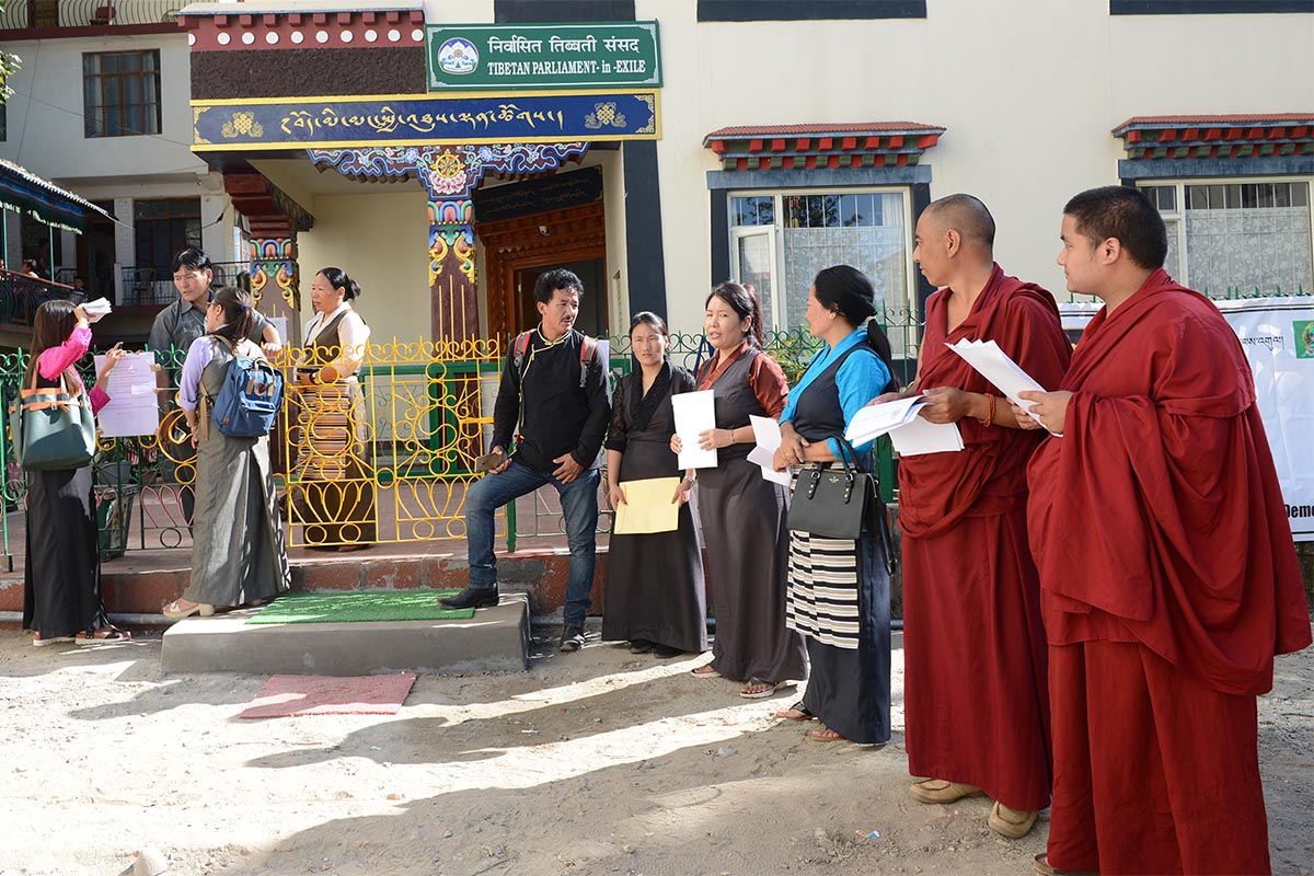 President of United Tibetans Tenzin Sangmo (fourth right), with other members of the group, handing out documents asking the Tibetan Parliament-in-exile and the Kashag to take action against Dawa Tsering to hand over the Yongling Kindergarten to the Central Tibetan Administration according to court order, in Dharamshala, India, on 19 September 2017.