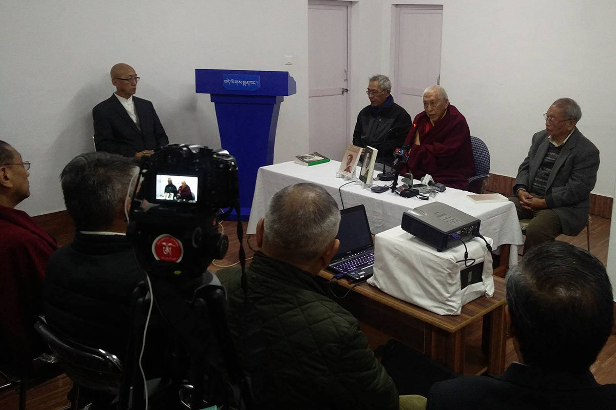 Prof Samdhong Rinpoche speaks during the launch of Rinchen Sadutshang's autobiography  _A Life Unforeseen: A Memoir of Service to Tibet_, in Dharamshala, India, on 4 December 2017. Rinchen Sadutshang's son Dr Tsetan Dorji Sadutshang, MD, MPH, Chief Medical Officer at the Tibetan Delek Hospital is seen on the left.