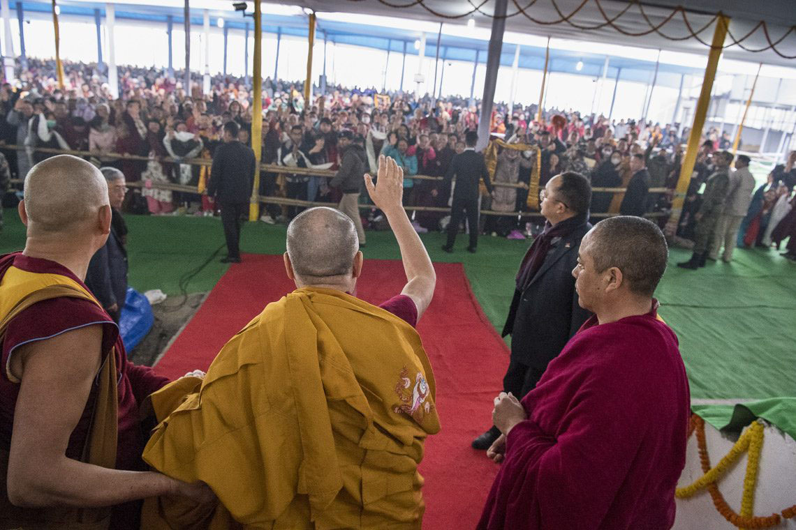 Tibetan spiritual leader the Dalai Lama waves to devotees at the Kalachakra ground in Bodh Gaya, India, on 18 January 2018.