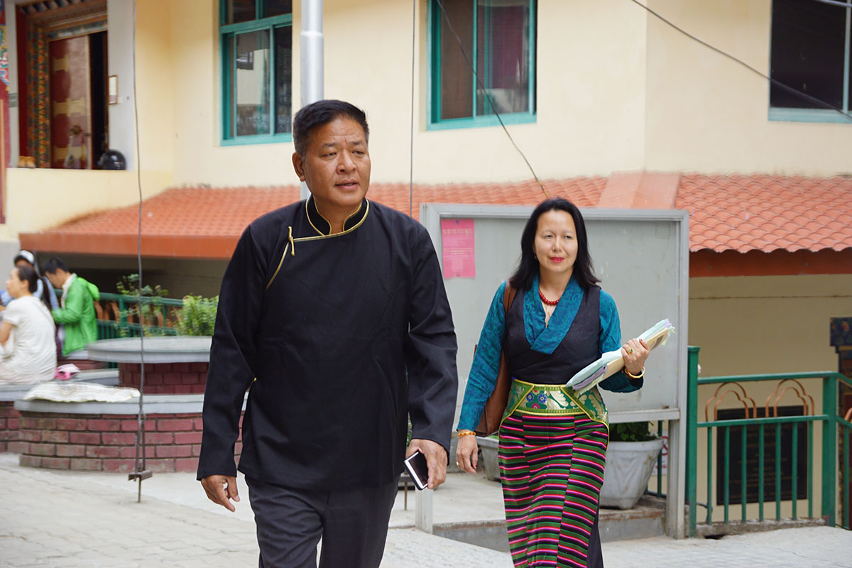 Penpa Tsering and his lawyer Namgyal Tsekyi arrive to file a case against the Cabinet led by Lobsang Sangay of the Central Tibetan Administration for levelling 
