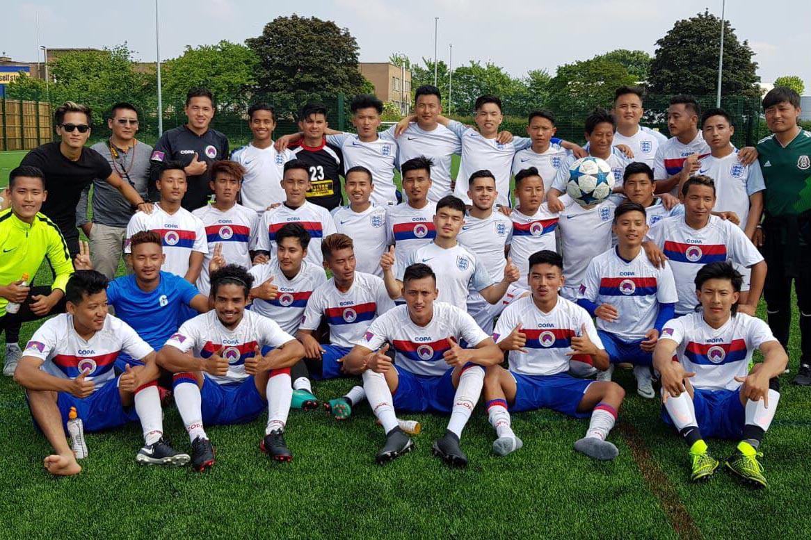 Players of the Tibetan National Football team pose for a photo in London on 28 May 2018.