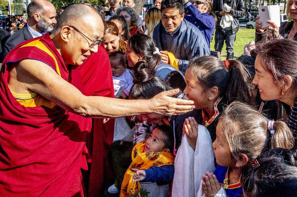 The Dalai Lama meeting fans and faithful after arriving in Rotterdam on 14 September 2018.