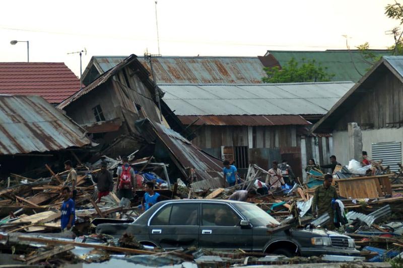Amid Palu's levelled trees, overturned cars, concertinaed homes and flotsam tossed up to 50 metres inland, residents and rescuers struggled to come to grips with the scale of the disaster.