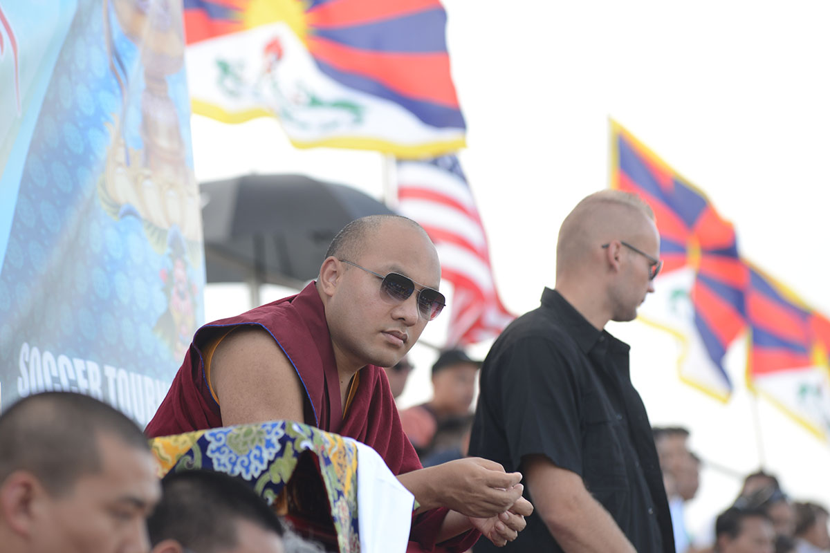 The Karmapa Lama looks on during the Gyalyum Chenmo Memorial Gold Cup being played between Team Tibet of New York/New Jersey and Cholsum Football Club of Toronto, in New York City on 2 September 2018.