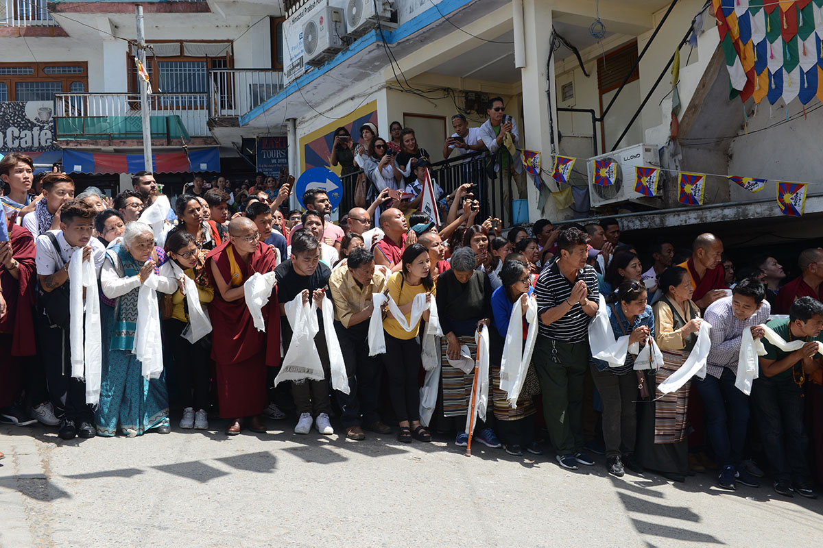 Devotees and well-wishers welcome Tibetan spiritual leader the Dalai Lama back to his home after fully recovering, in McLeod Ganj, India, on 26 April 2019. He was taken to Delhi for a lung infection treatment on earlier on 10 April.