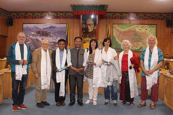 Speaker of Tibetan Parliament-in-exile Pema Jungney with members of 'Tibet — les Enfants de l’Espoir' (Hope for Tibetan Children) in the Tibetan Parliament house in Dharamshala, India, on 8 April 2019.