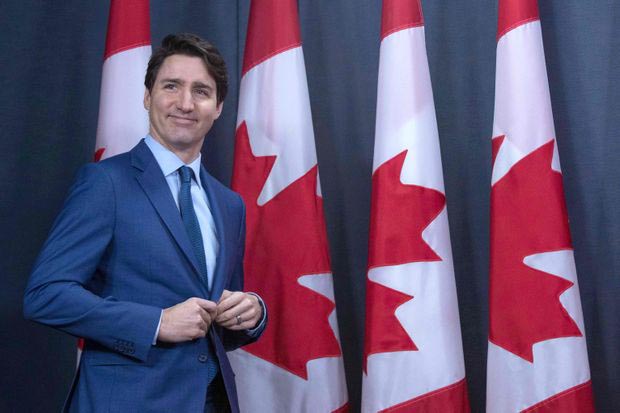 Prime Minister Justin Trudeau arrives to speak to the media at the national press gallery in Ottawa on 7 March 2019.