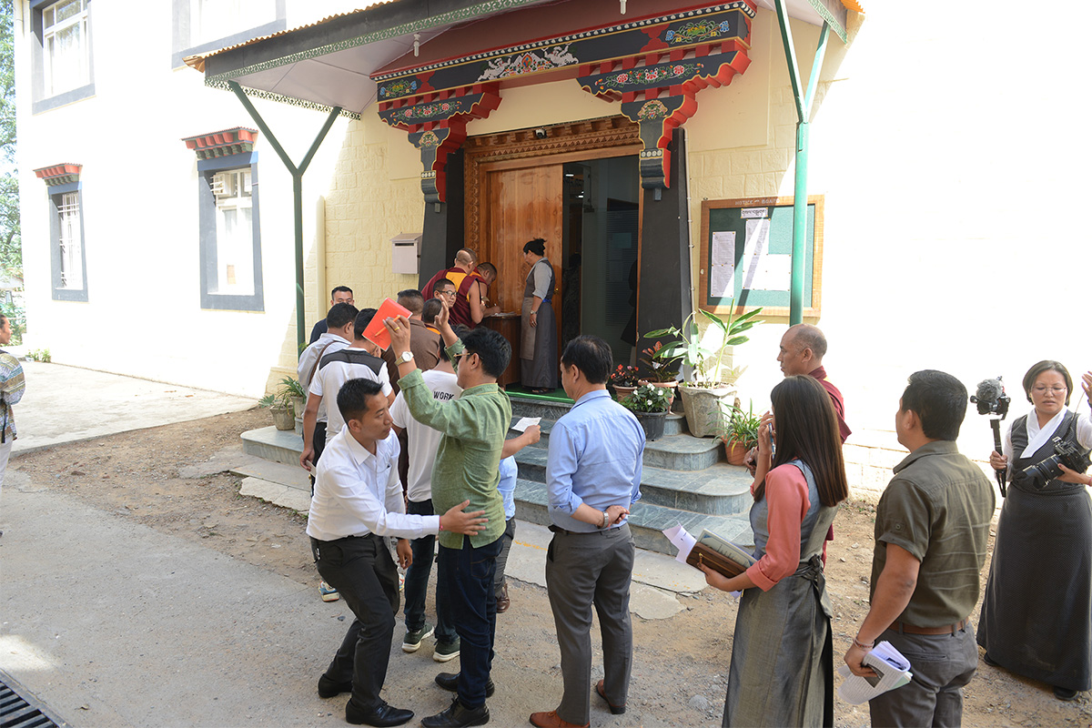 Officials frisk the observers and journalists before letting them enter the courtroom of the Tibetan Supreme Justice Commission in Dharamshala, India, on 5 June 2019.