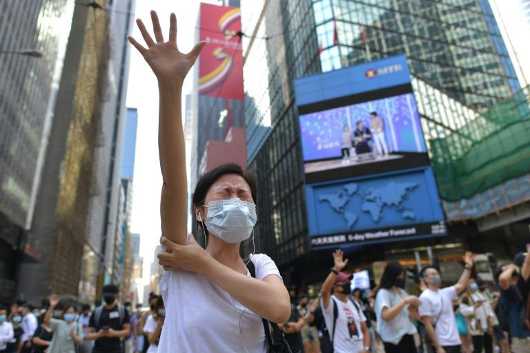 Protesters responded to the new law by hitting the streets, with masks on.