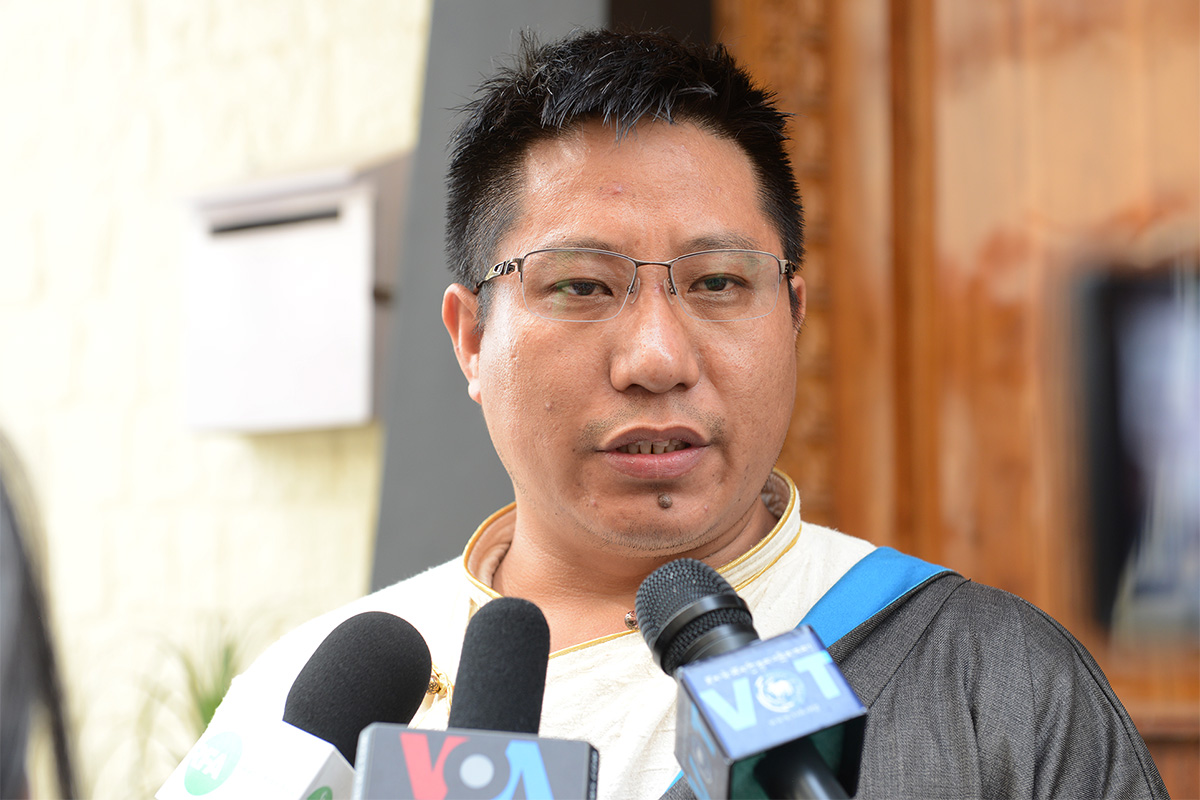 Lobsang Dakpa, defendant lawyer of President of Central Tibetan Administration Lobsang Sangay and his Cabinet, speaks to the press after the first hearing of the defamation case filed by Penpa Tsering against them, in Dharamshala, India, on 5 June 2019. 