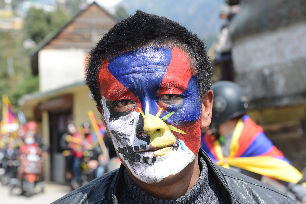 An exile Tibetan youth, face painted with Tibetan flag, takes part in a protest march from McLeod Ganj to Dharamshala on the 61st anniversary of the 1959 Tibetan uprising against the Chinese invasion, in McLeod Ganj, India, 10 March 2020. 