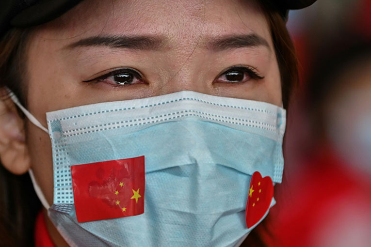 Chinese medical staff volunteers began to leave Wuhan after the airport reopened following the end to a travel ban.