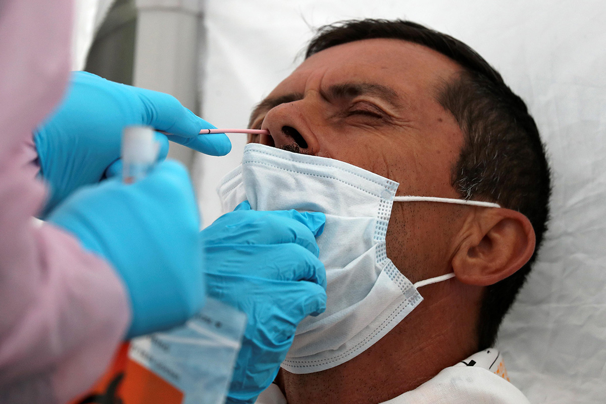Truck driver Oswaldo Monroy, 62, is tested for COVID-19 at an International Brotherhood of Teamsters testing site, as the spread of the coronavirus disease (COVID-19) continues, in Wilmington, near the Port of Los Angeles, California, US, on 25 June 2020. 