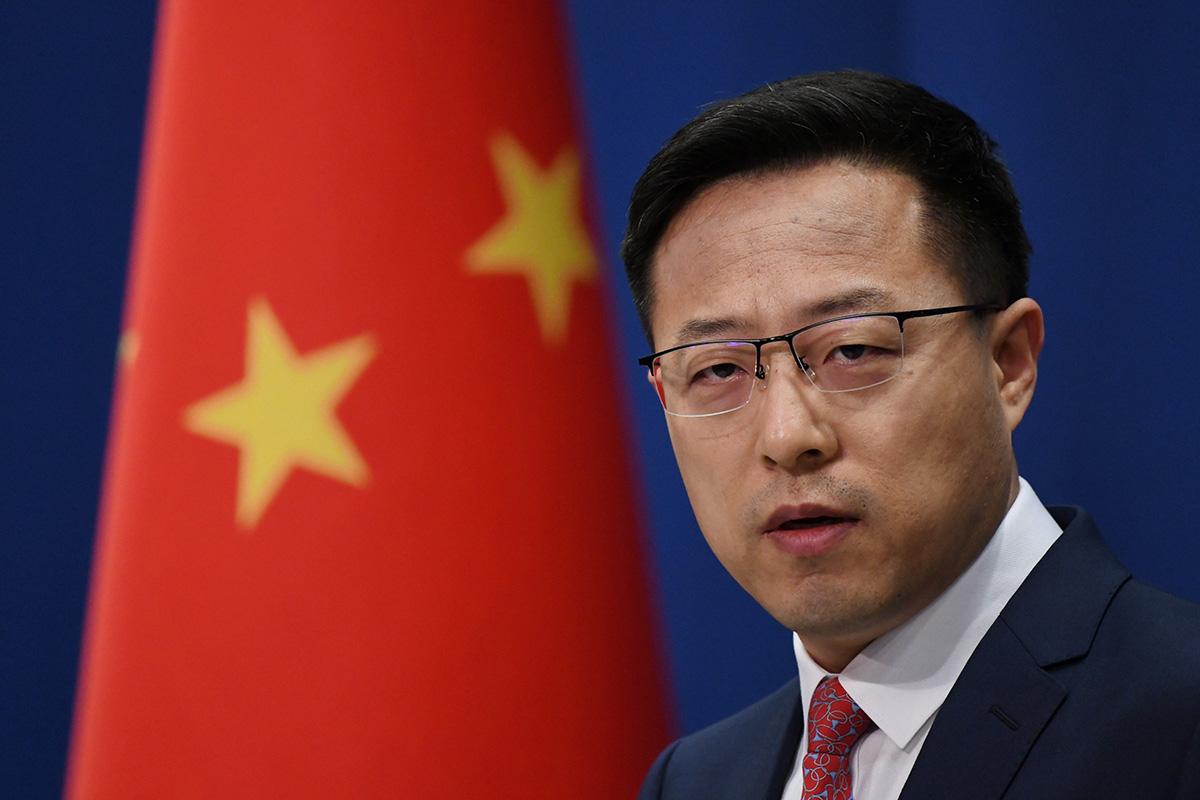 Chinese Foreign Ministry spokesman Zhao Lijian speaks at the daily media briefing in Beijing on 8 April 2020.