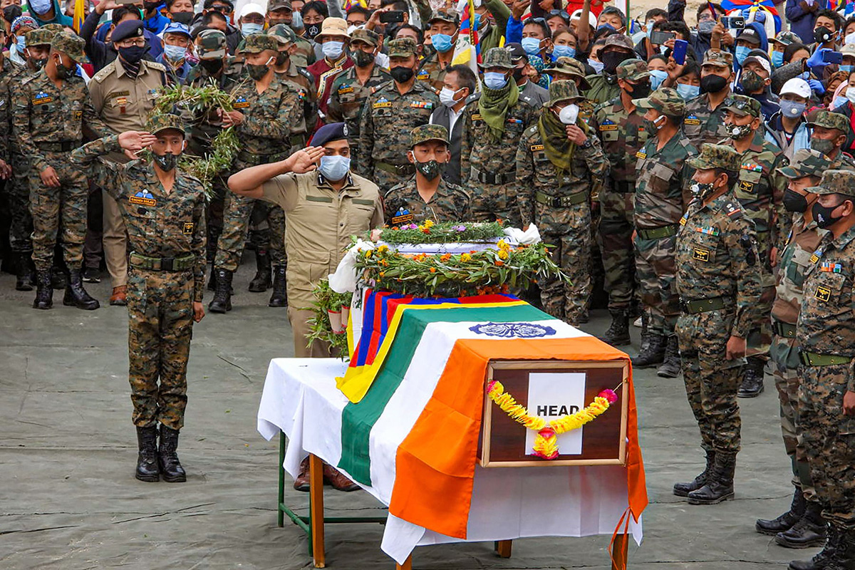 Indian Army officials pay tribute to Special Frontier Force soldier Nyima Tenzin during a wreath-laying ceremony in Devachan, Leh, on 7 September 2020.