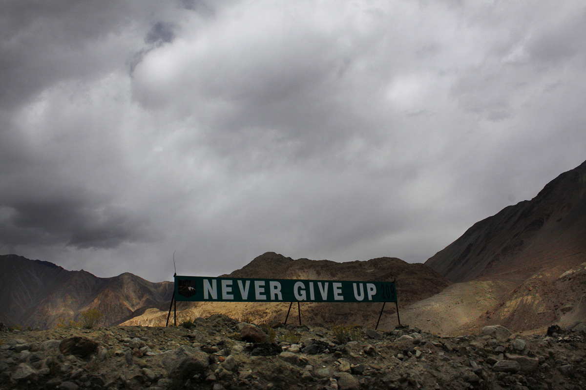 In this 14 September 2017, file photo, a banner erected by the Indian army stands near Pangong Tso lake near the India-China border in India’s Ladakh area. Senior Indian and Chinese military commanders are holding fresh talks aimed at ending a monthslong standoff along their disputed border. Monday’s talks were being held on the Indian side of the frontier. No details were immediately made available.