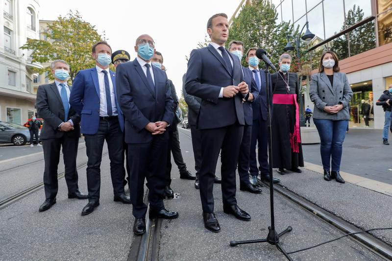 French President Emmanuel Macron speaks to the media during the visit to the scene of a knife attack at Notre Dame church in Nice, France, on 29 October 2020.