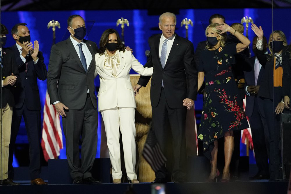 From left, Doug Emhoff, husband of Vice President-elect Kamala Harris, Harris, President-elect Joe Biden, and his wife Jill Biden, on stage together, on 7 November 2020, in Wilmington, US. 