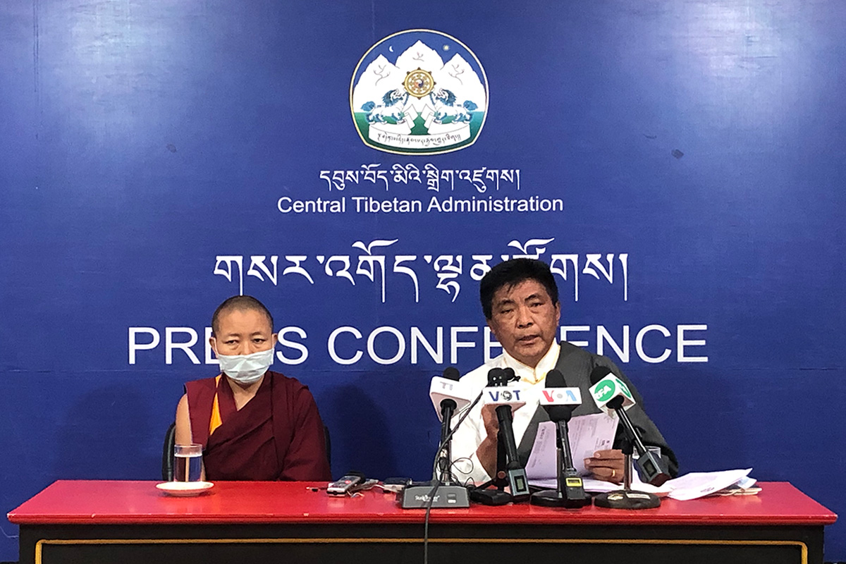 Chief Election Commissioner of Central Tibetan Administration Wangdu Tsering Pesur speaks during a press conference at its headquarters in Dharamshala, India,  on 16 November 2020. Assistant Commissioner Geshema Delek Wangmo is seen on the left. 